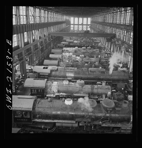 Untitled photo, possibly related to: San Bernardino, California. A general view in the Atchison, Topeka, and Santa Fe Railroad locomotive shops