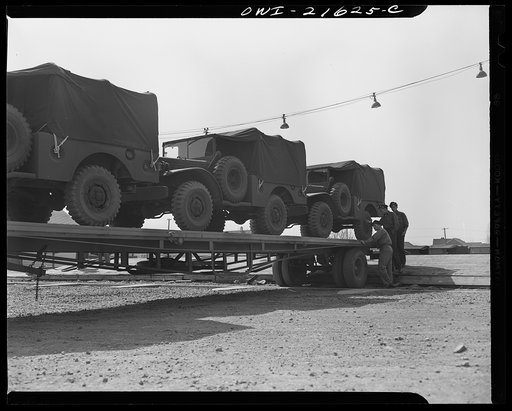 Detroit, Michigan. Army trucks on a haulaway