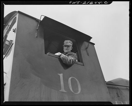 Detroit, Michigan. The engineer in one cab of a locomotive