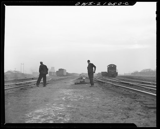 Detroit, Michigan. Trainmen in the freight yard