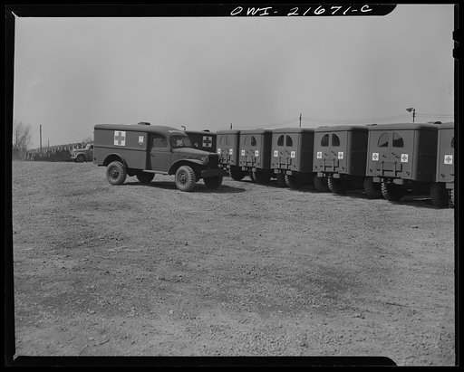 Detroit, Michigan. Ambulances waiting to be loaded on to haulaways