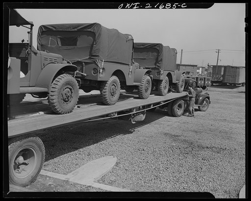 Detroit, Michigan. Army trucks on a haulaway