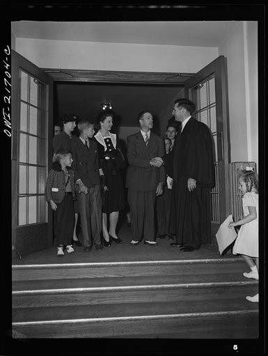 Rochester, New York. The minister greeting the Babcocks as they are leaving church after Sunday services