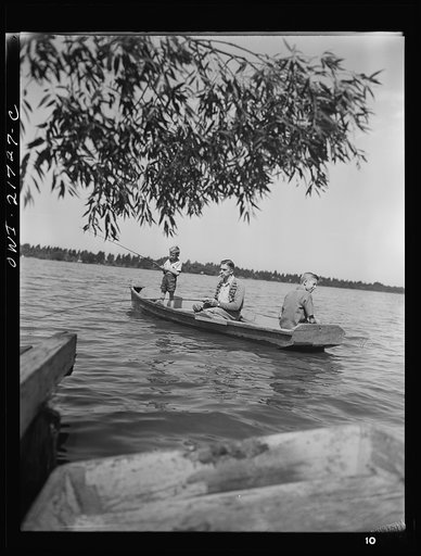 Untitled photo, possibly related to: Rochester, New York. Mr. Babcock and his two sons, Earl and Howard, fishing on Sunday afternoon