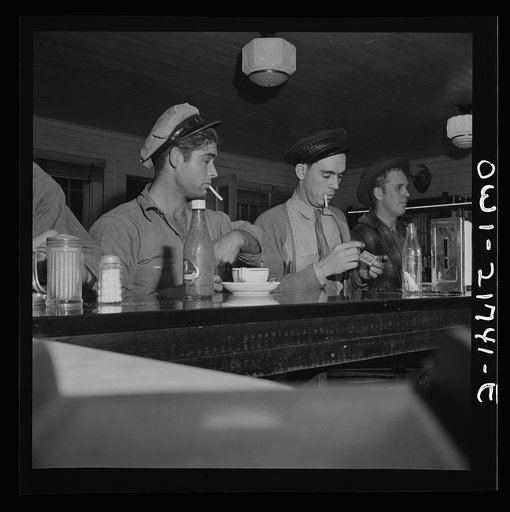 Pearlington (vicinity), Mississippi. Truck drivers at a highway coffee stop on U.S. Highway 90