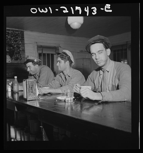 Untitled photo, possibly related to: Pearlington (vicinity), Mississippi. Truck drivers at a highway coffee stop on U.S. Highway 90