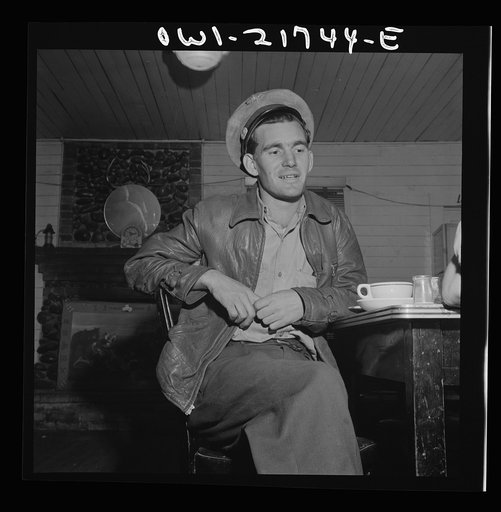 Pearlington, Mississippi. Truck driver at a highway coffee stop on U.S. Highway 90