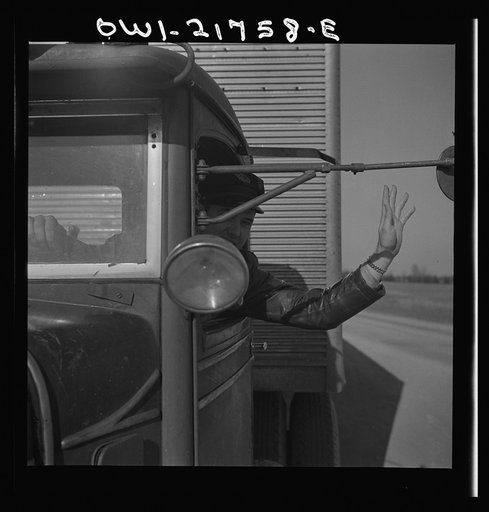 Untitled photo, possibly related to: Melvin Cash driving a truck to Charlotte, North Carolina on U.S. Highway 29