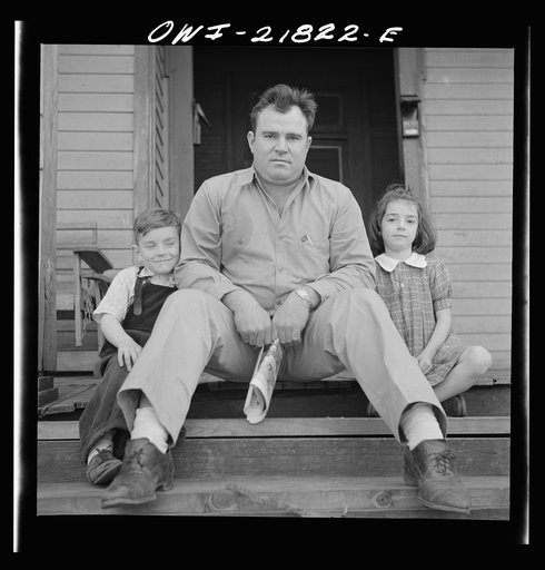 Untitled photo, possibly related to: Montgomery, Alabama. Marvin Johnson, truck driver, with his two children