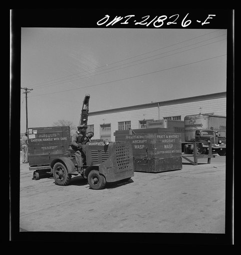 Untitled photo, possibly related to: Gunter Field, Alabama. Trucks being loaded