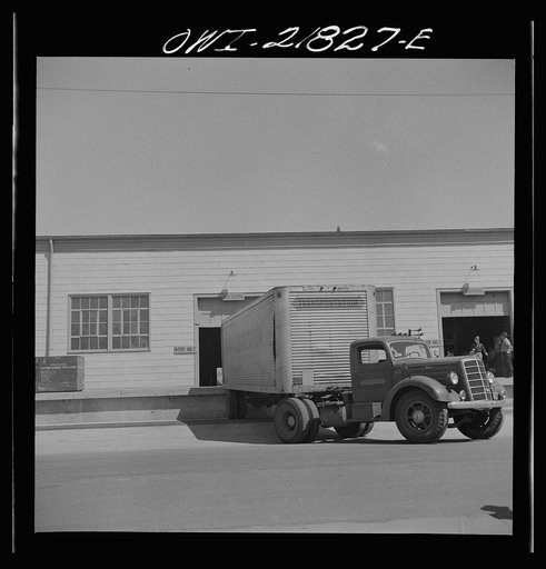Untitled photo, possibly related to: Gunter Field, Alabama. Trucks being loaded