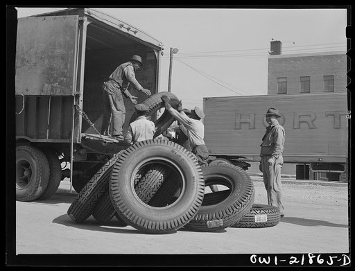 Charlotte, North Carolina. Loading tires onto a truck at the terminal of the Associated Transport Company for shipment to other terminals