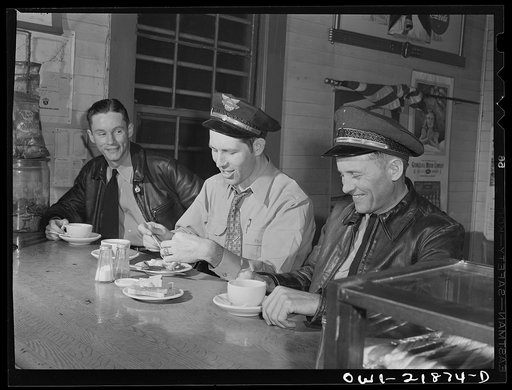 John Phillips (right) with other truck drivers at a midnight coffee stop on U.S. Highway 29 enroute to Mobile, Alabama