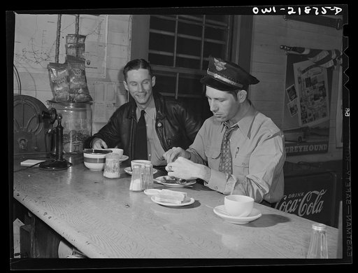 Untitled photo, possibly related to: John Phillips (right) with other truck drivers at a midnight coffee stop on U.S. Highway 29 enroute to Mobile, Alabama