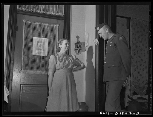 Montgomery, Alabama. Mrs. Brannon talking with a soldier stationed at the same camp as her son