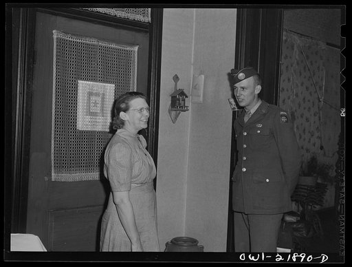 Untitled photo, possibly related to: Montgomery, Alabama. Mrs. Brannon talking with a soldier stationed at the same camp as her son