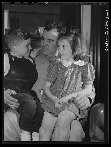 Montgomery, Alabama. Marvin Johnson, truck driver, with his two children