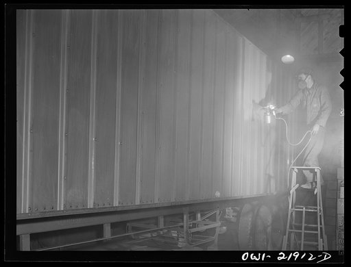Untitled photo, possibly related to: Charlotte, North Carolina. Painting a trailer at the Brown Equipment Company