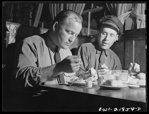 Jim Bishop and Joe Crow eating dinner at a truckers' stop on U.S. Highway 29 near the Alabama-Georgia state line