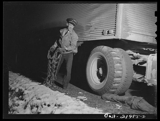 Jim Fletcher putting on chains while crossing mountains in eastern Tennessee