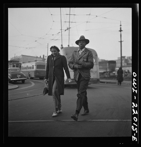 Baltimore, Maryland. Workers hurrying to catch a conveyance for work at seven a.m.