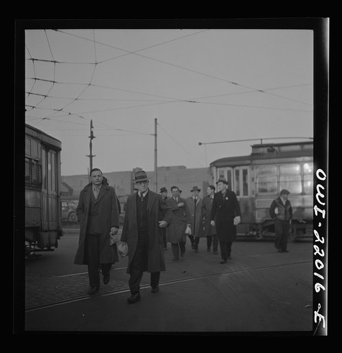 Untitled photo, possibly related to: Baltimore, Maryland. Workers hurrying to catch a conveyance for work at seven a.m.