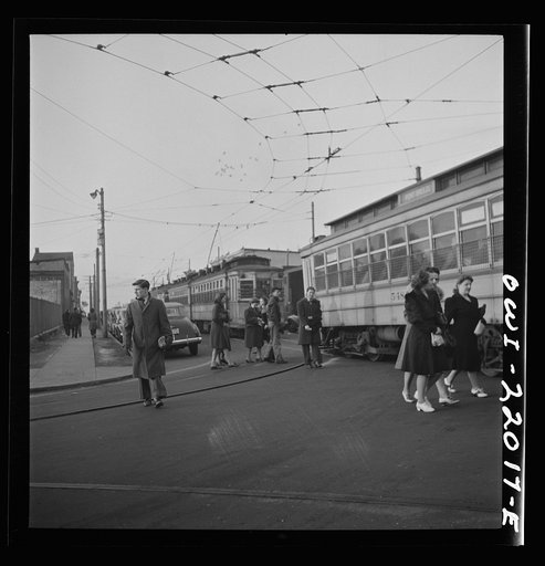 Untitled photo, possibly related to: Baltimore, Maryland. Workers hurrying to catch a conveyance for work at seven a.m.