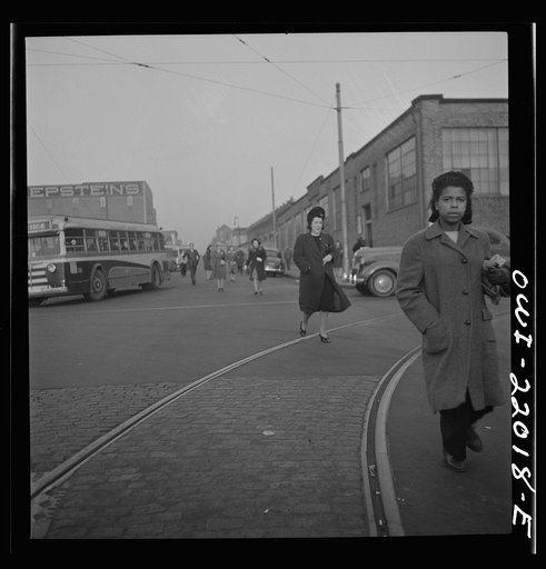 Untitled photo, possibly related to: Baltimore, Maryland. Workers hurrying to catch a conveyance for work at seven a.m.