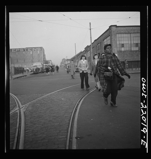 Baltimore, Maryland. Workers hurrying to catch a conveyance for work at seven a.m.