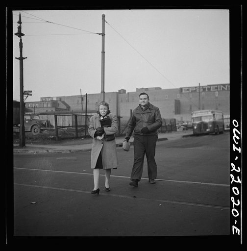 Untitled photo, possibly related to: Baltimore, Maryland. Workers hurrying to catch a conveyance for work at seven a.m.