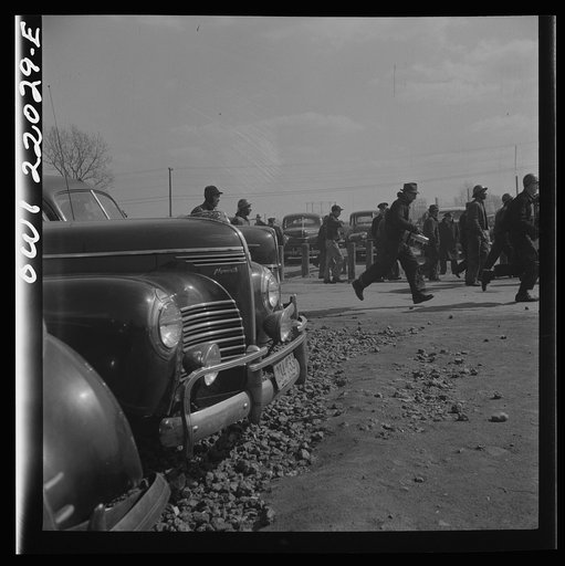 Untitled photo, possibly related to: Baltimore, Maryland. Workers on the second shift who leave the Bethlehem Fairfield shipyard at three p.m. to get trolleys and automobiles