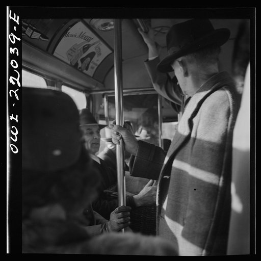 Untitled photo, possibly related to: Baltimore, Maryland. Crowded bus carrying people to work at eight a.m.