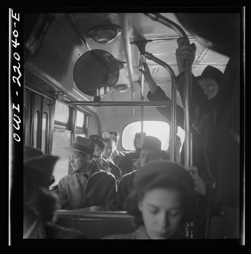Baltimore, Maryland. Crowded bus carrying people to work at eight a.m.