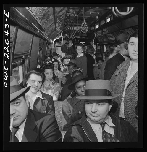 Baltimore, Maryland. School children and workers returning home on a trolley at five p.m.