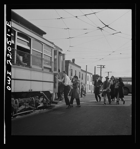 Baltimore, Maryland. Workers rushing to catch the trolley home at four p.m.