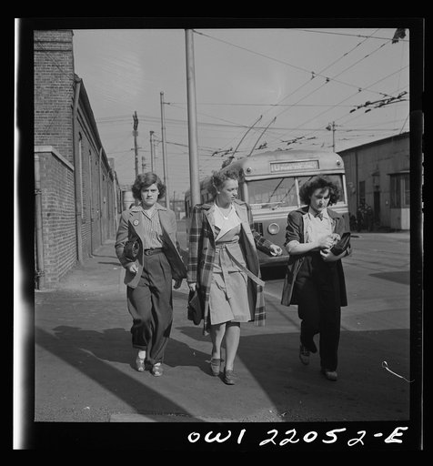 Untitled photo, possibly related to: Baltimore, Maryland. Rushing to catch the trackless trolleys home from work at four p.m.