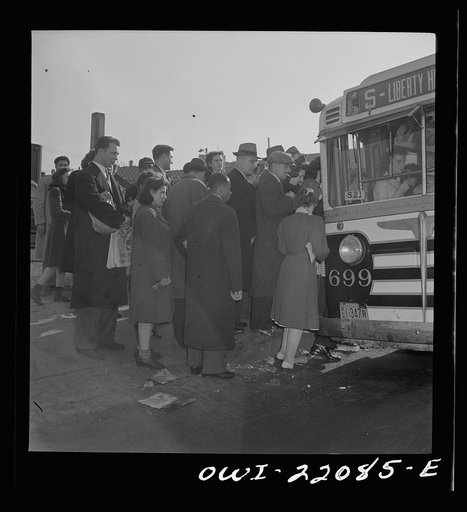 Baltimore, Maryland. Boarding a bus at four p.m.