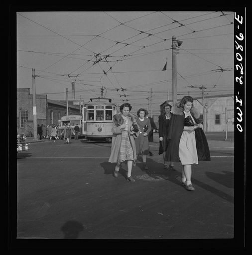 Baltimore, Maryland. Transferring from a trolley to a bus at four p.m.