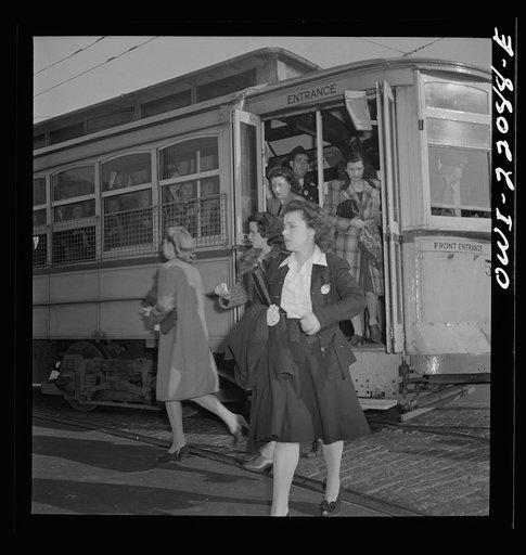 Baltimore, Maryland. Getting off a trolley at five p.m.