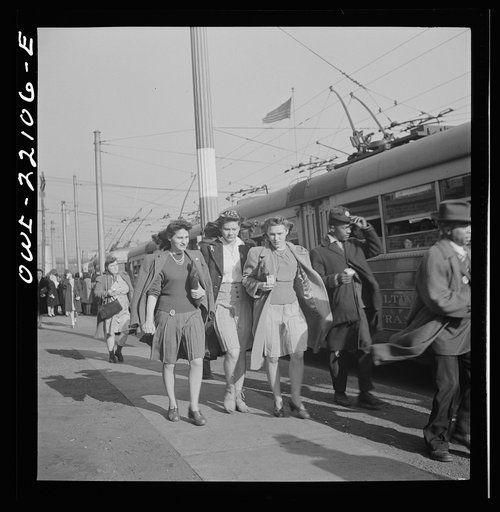 Baltimore, Maryland. Rushing to catch a trackless trolley home from work at four p.m.