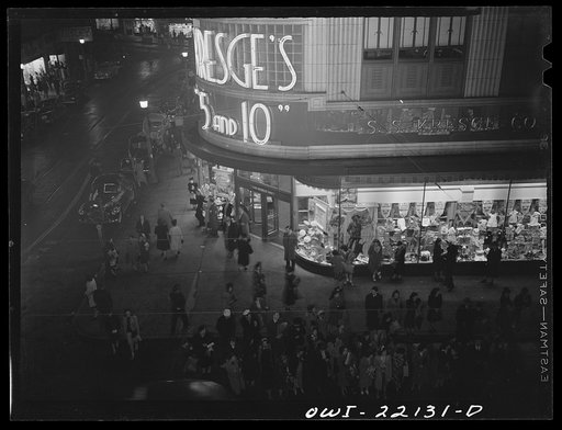 Untitled photo, possibly related to: Baltimore, Maryland. Shopping district just before closing time at nine p.m. on Thursday night