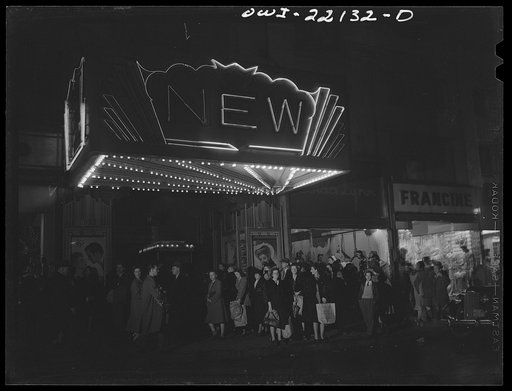 Baltimore, Maryland. Thursday night shoppers in a line outside a movie theatre