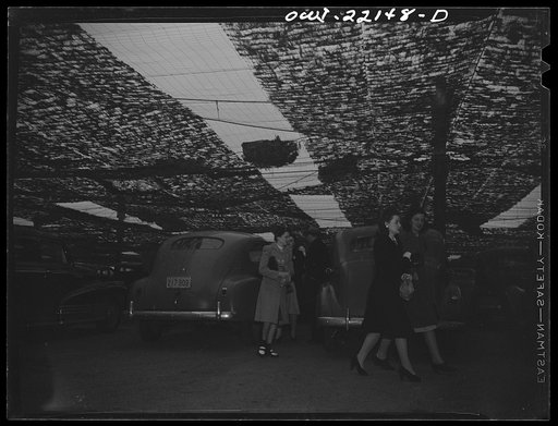 Baltimore, Maryland. Workers arriving in shared cars at the Glenn L. Martin camouflaged parking space at seven a.m.