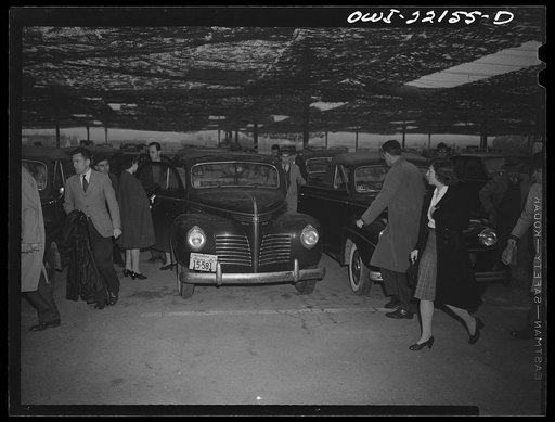 Baltimore, Maryland. Workers arriving in shared cars at the Glenn L. Martin camouflaged parking space at seven a.m.
