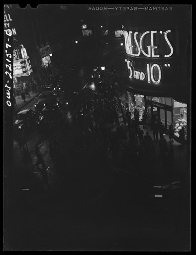 Untitled photo, possibly related to: Baltimore, Maryland. Shopping district just before closing time at nine p.m. on Thursday night