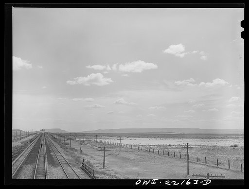 Atchison, Topeka, and Santa Fe Railroad train stopping at a siding enroute to Needles, California