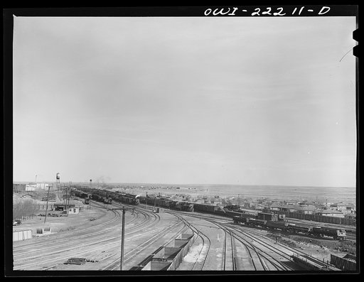Winslow, Arizona. General view of the countryside and part of the Atchison, Topeka, and Santa Fe Railroad yard