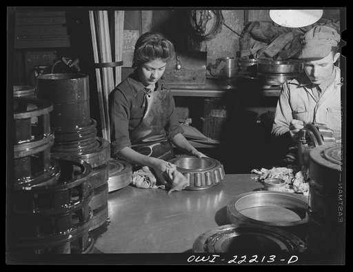 San Bernardino, California. Juanita Martinez Hernandez cleaning roller bearings at the Atchison, Topeka, and Santa Fe Railroad locomotive shops