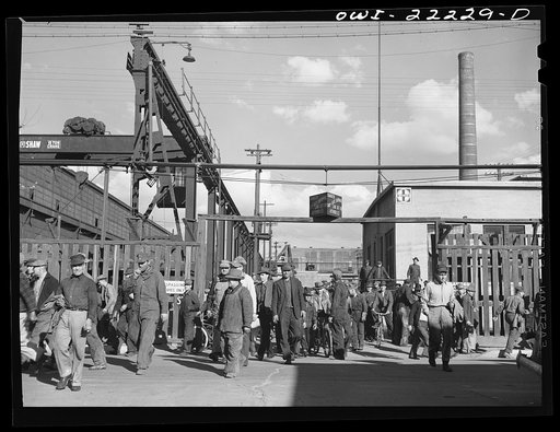 Albuquerque, New Mexico. Men coming out of the Atchison, Topeka, and Santa Fe Railroad shops at the end of the day's shift
