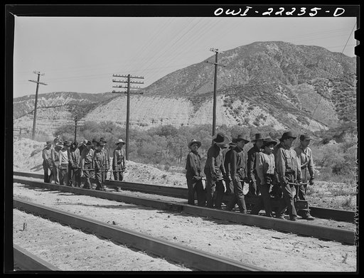 Untitled photo, possibly related to: Cajon, California. Indian section gang working on the Atchison, Topeka, and Santa Fe Railroad track
